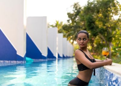 Munjoh Ocean Resort Pool Suite_pool image with woman in pool