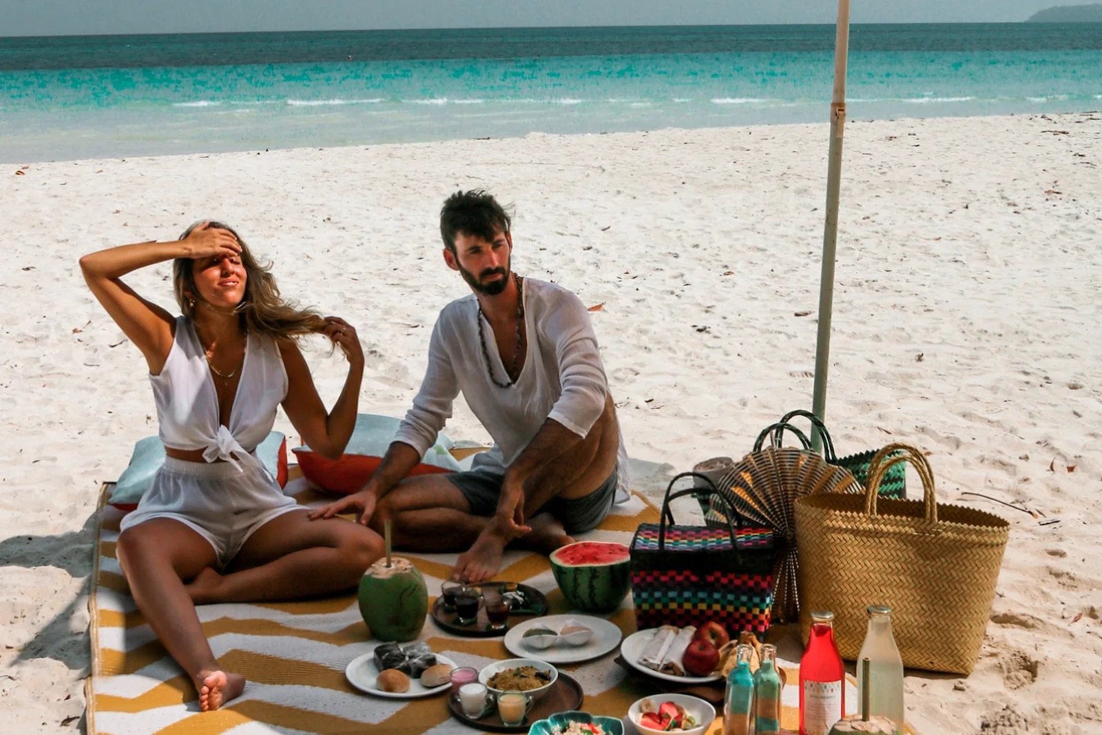 Guests enjoying a beach breakfast at Munjoh Ocean Resort on Havelock Island