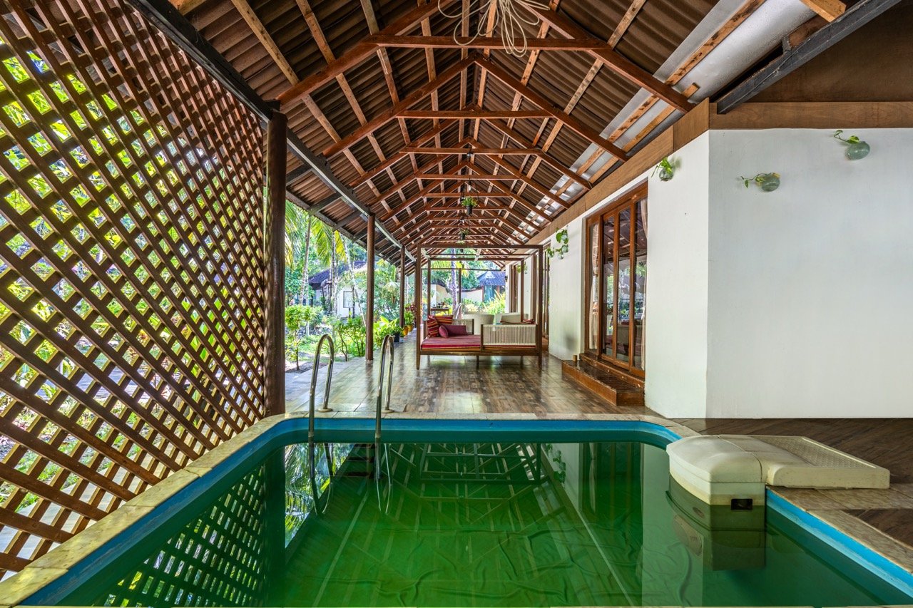 Private plunge pool and covered verandah at the Royal Chalet